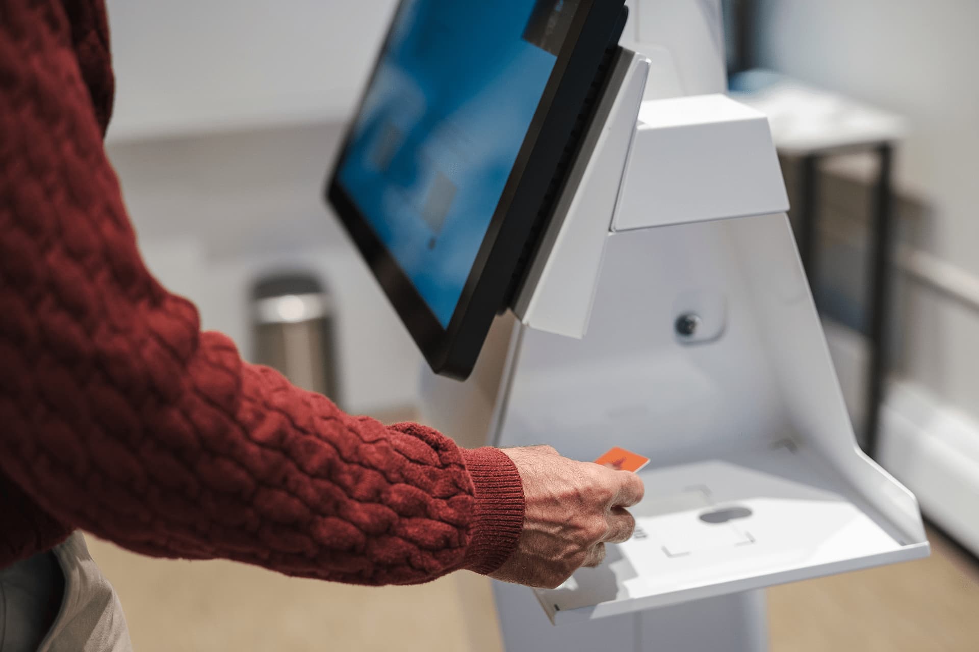 person-using-the-healthcare-kiosk Person using the healthcare kiosk